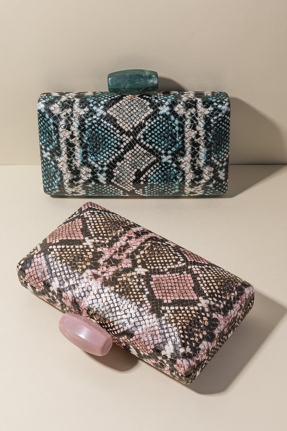 Clutch Box Lawrence Rosa · Rivera · - Bruna